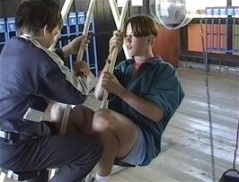 Nick and Kieron have fun on one of the swings at the Mount Hangur cableway station, Voss